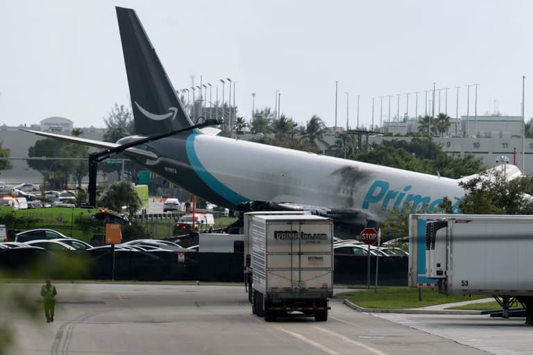 At least five people dead after Amazon cargo plane overshoots runway at US airport At least five people dead after Amazon cargo plane overshoots runway at US airport