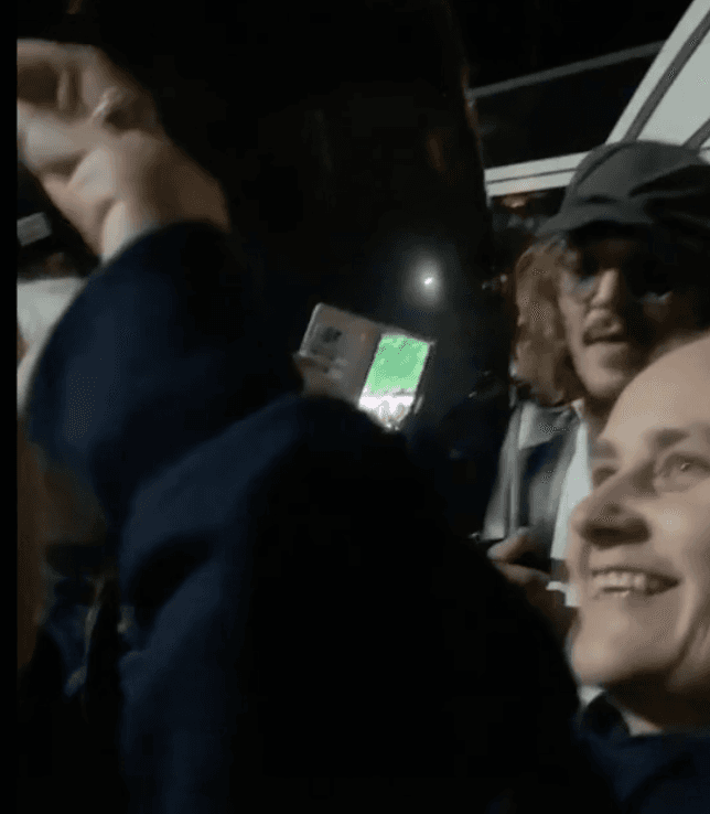 Brits in disbelief as Johnny Depp casually poses for pictures and shakes hands with fans
