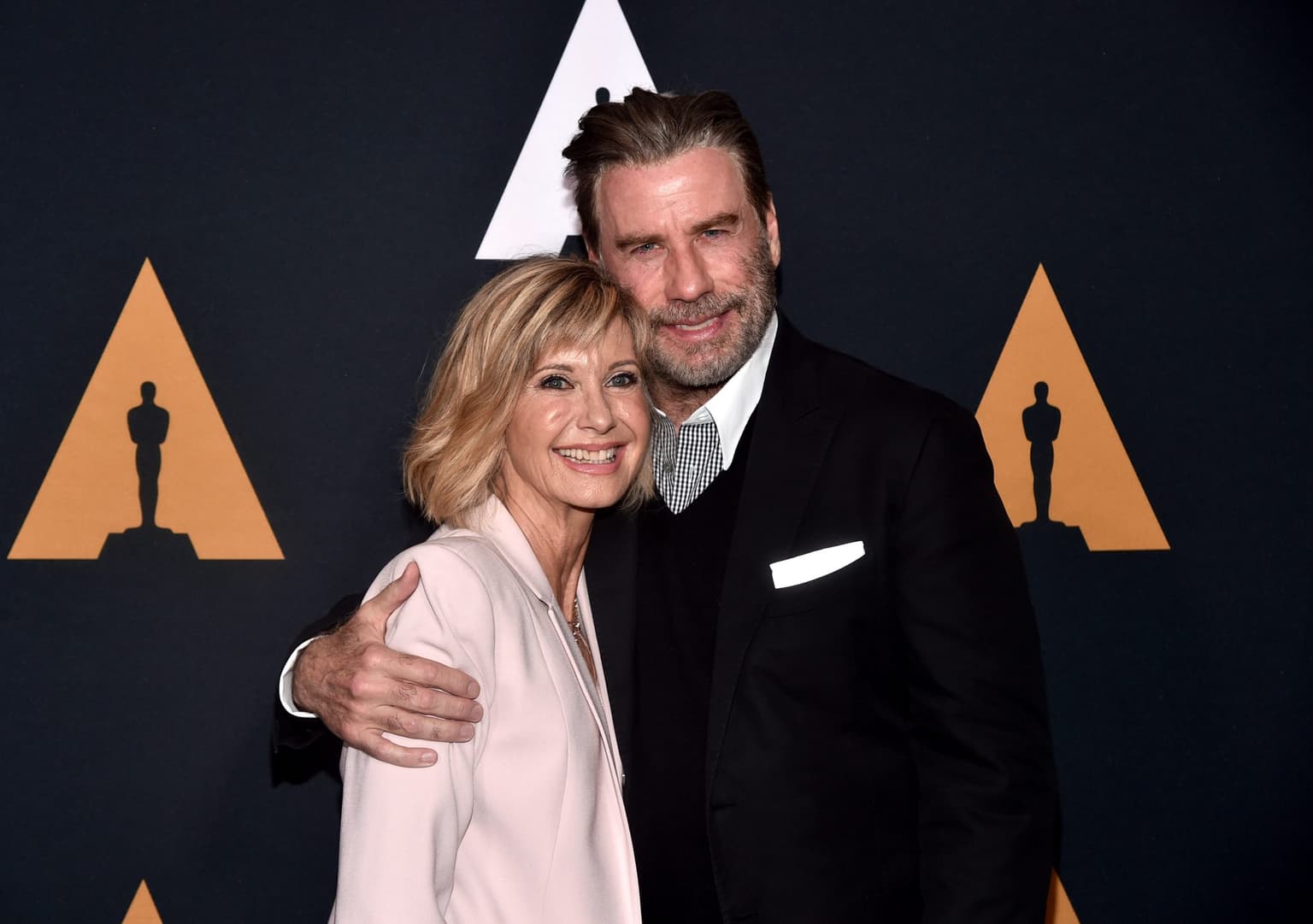 John Travolta pays heartfelt tribute to Grease co-star Olivia Newton John