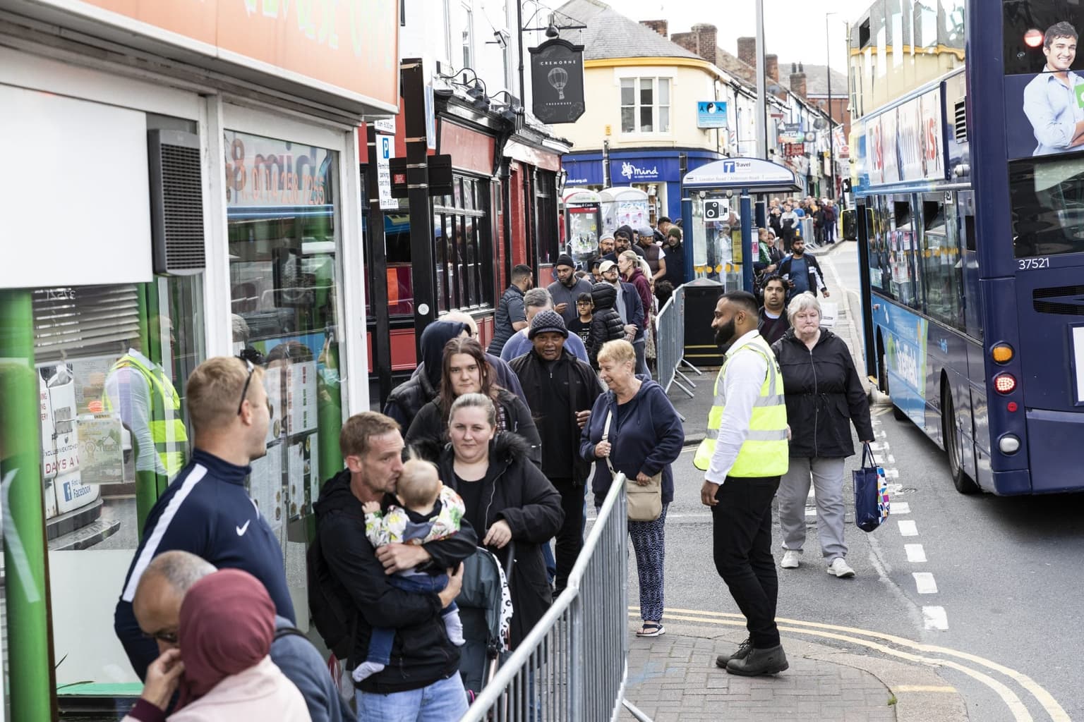 Hundreds of people queue after fish and shop serve portions for just 45p