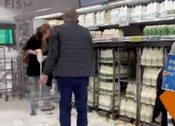 Vegan protesters pour milk onto shop floor in the name of activism
