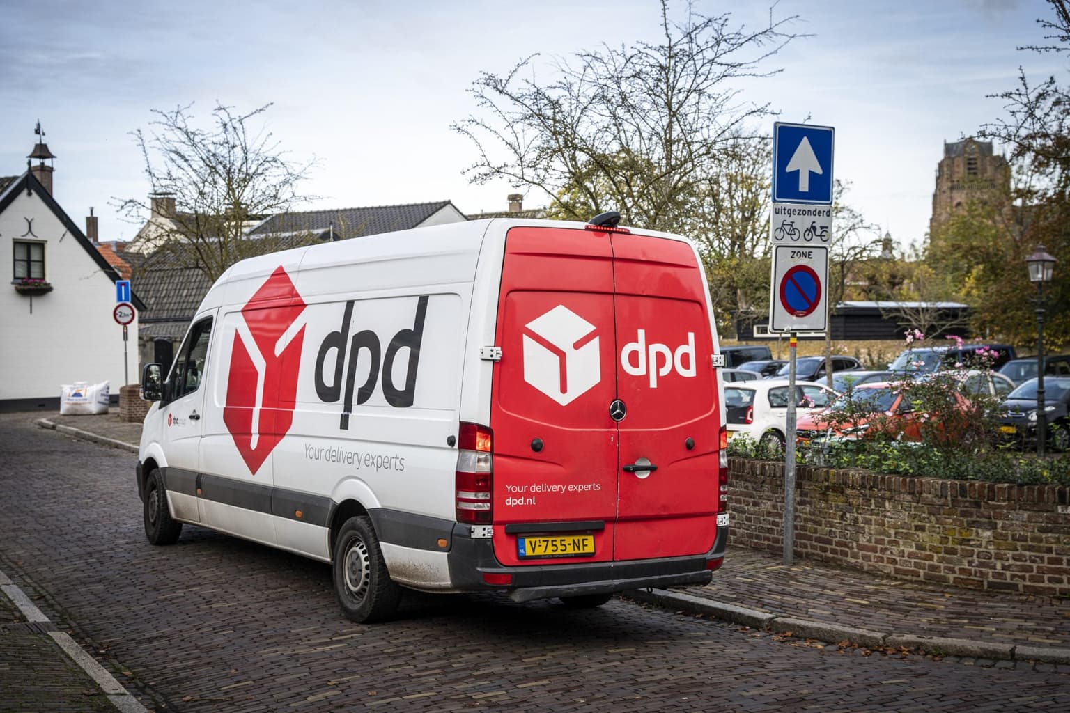 Courier, 49, found dead behind wheel of van after working seven-day weeks and 14-hour days