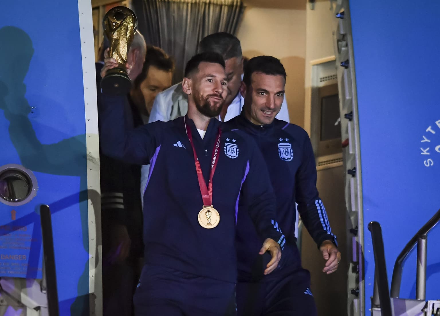 Argentina’s footballers land in Buenos Aires as national holiday is declared in the country