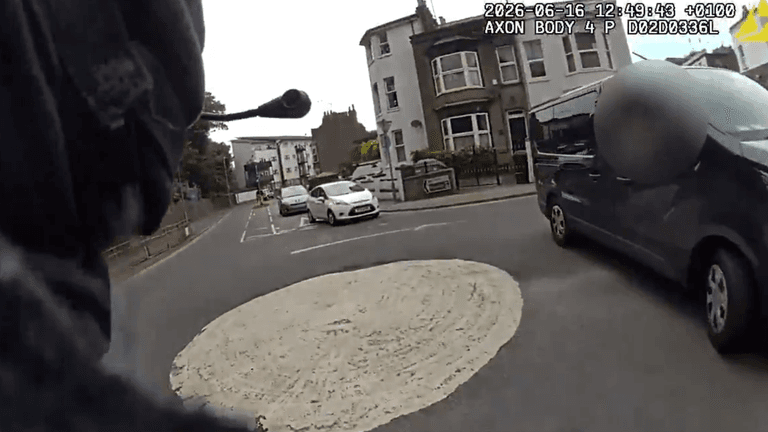 Watch incredible moment van driver helps armed police catch suspect Watch incredible moment van driver helps armed police catch suspect