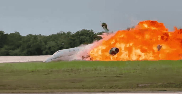 Plane erupts in huge fireball following emergency landing Plane erupts in huge fireball following emergency landing