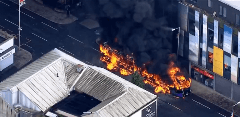 Bus set on fire and projectiles thrown at police as disorder erupts in Belfast Bus set on fire and projectiles thrown at police as disorder erupts in Belfast
