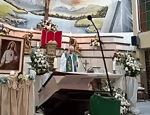 Priest dies after massive crucifix falls onto him during livestreamed mass Priest dies after massive crucifix falls onto him during livestreamed mass