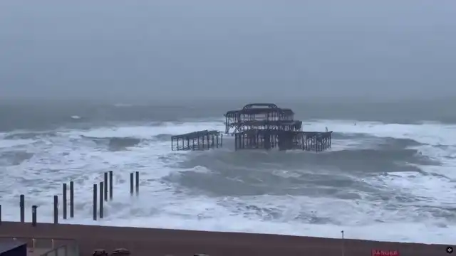 Historic pier partially collapses into sea as Storm Austen batters UK Historic pier partially collapses into sea as Storm Austen batters UK