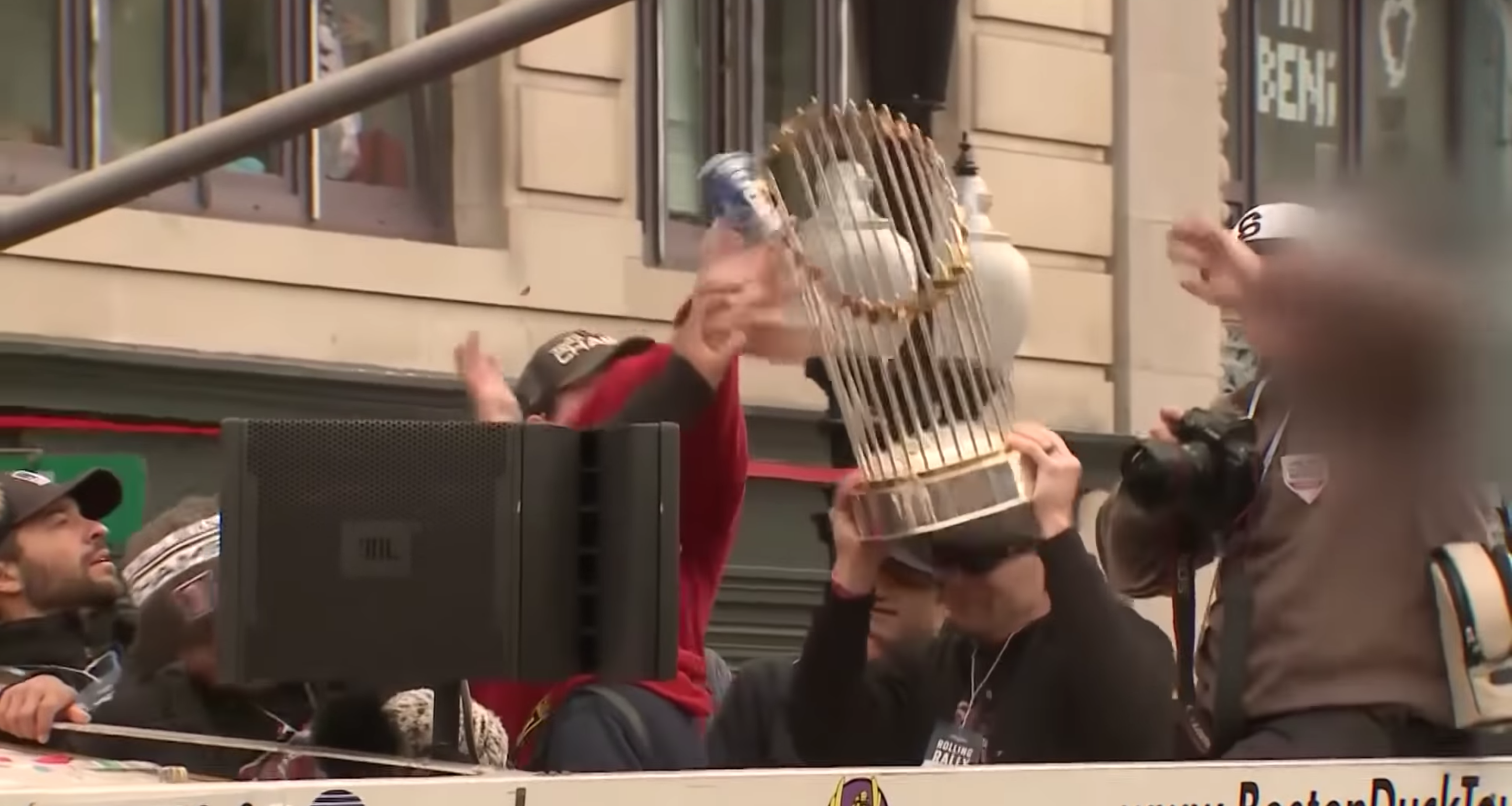 Fans awed by Cubs, Red Sox Series trophies