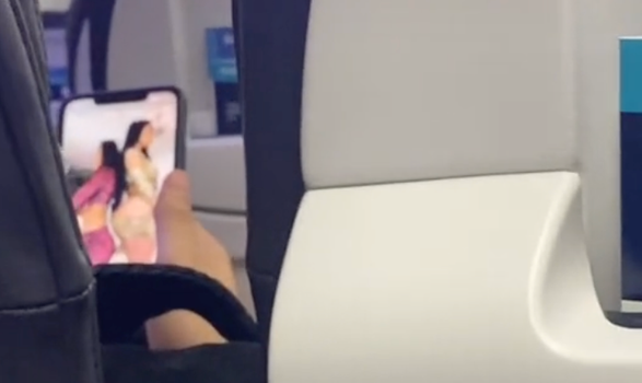 On Plane - Plane passenger busts man 'watching porn' while girlfriend sleeps